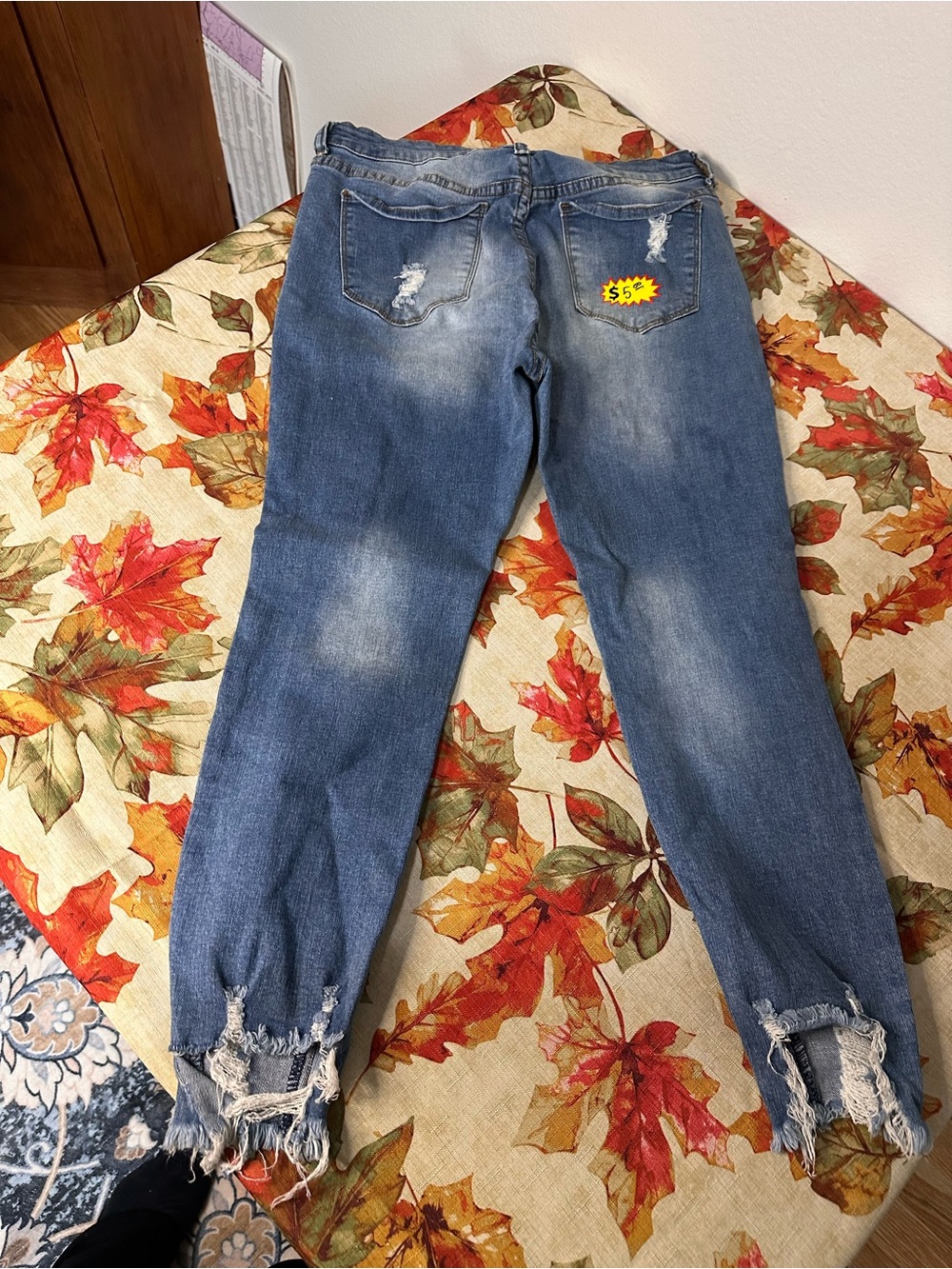 Women’s Distressed Boyfriend Jeans in Faded Blue